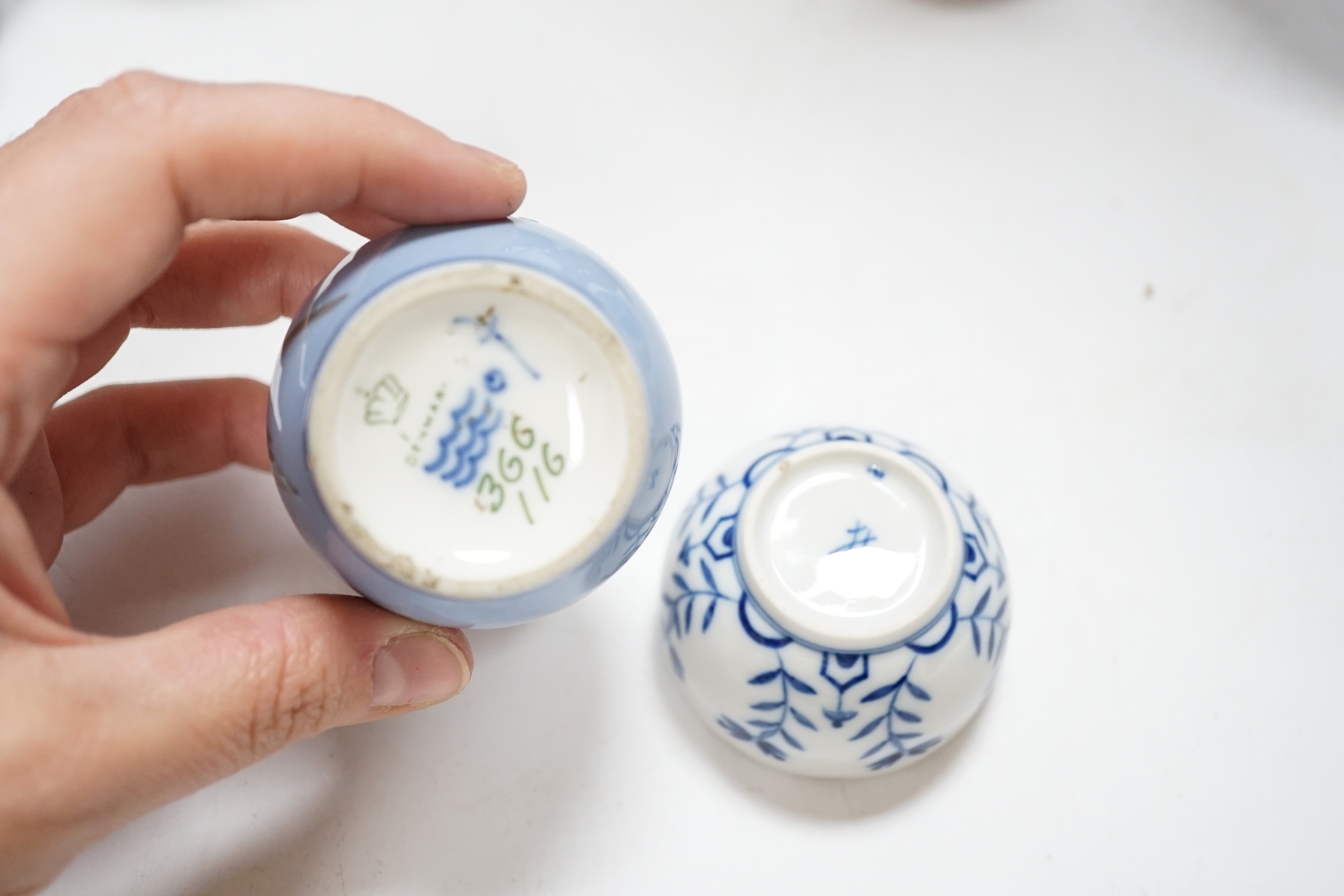 A Chinese cinnabar lacquer jar and cover, a Chinese copper red bottle vase, a carved wood figure, a Meissen miniature bowl and other ceramics, jar 15cm